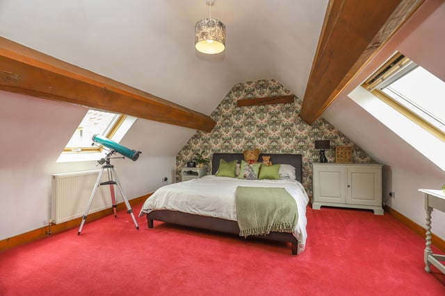 Three of the four bedrooms are on the upper floor where a galleried landing splits one from the other two to form a guest room for overnight visitors or relatives on a longer stay.