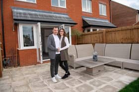 Gary and Kayleigh outside their new Bellway home