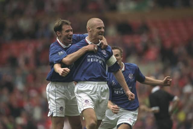 Sean Dyche celebrates scoring his penalty in the FA Cup semi-final against Middlesbrough at Old Trafford.