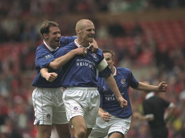 Sean Dyche celebrates scoring his penalty in the FA Cup semi-final against Middlesbrough at Old Trafford.