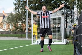 John King celebrates Heanor Town's first goal against Northampton ON Chenecks