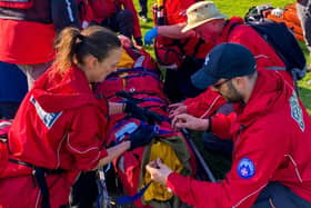 Buxton Mountain Rescue Team dealing with a walker who fell broke their jaw, perforated their ear drum and lost teeth. Pic BMRT.