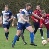 Action from Britannia Tupton's game with Crown Killamarsh (in red) in HKL TWO. Photos by Martin Roberts.