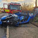 The car was left seriously damaged and two people were taken to hospital. 
Image: Bolsover Fire Station