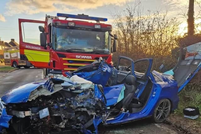 The car was left seriously damaged and two people were taken to hospital. 
Image: Bolsover Fire Station