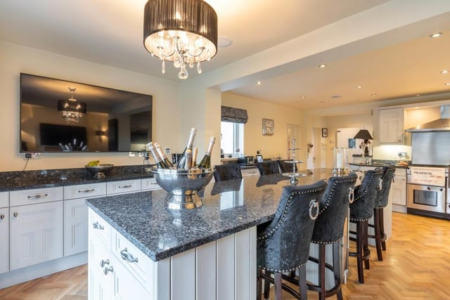 Let's launch our photo gallery of Freshfields by putting the champagne on ice in the open-plan living kitchen, whichis at the heart of the main house. Sleek, modern and luxurious, it is quite a room.