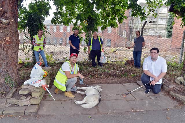 Members of Chesterfield and District Local History Society are breathing new life into the Coronation Gardens on Chatsworth Road. Back, Sean Crossland, Syd and John Barwick, Ben Laverick. Front, Ed Fordham with Sparky the Husky and Luke Povey. Pictures by Brian Eyre.
