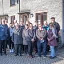 District councillors, officers, NCHA officers and Palfreyman Trust members outside the Soldiers Croft homes. (Photo: Derbyshire Dales District Council)