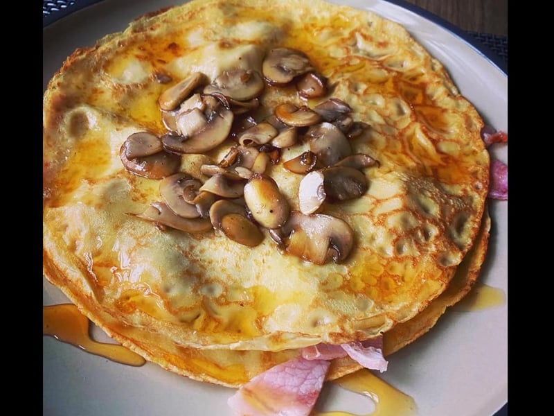 Two pancakes, bacon in the middle, mushrooms on top, syrup all over. That's how you do savoury!
