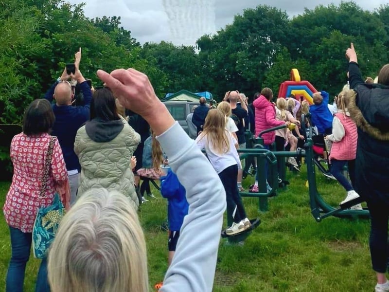 Phones at the ready to capture the flypast.