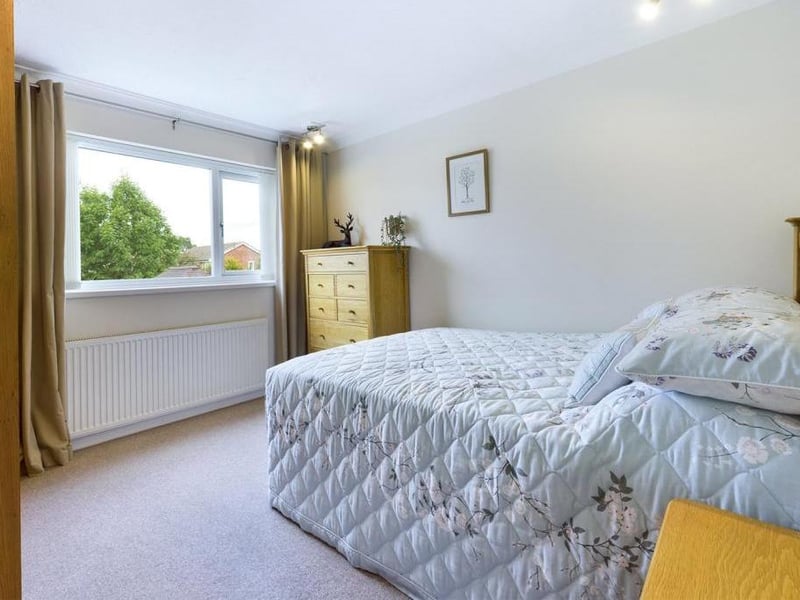 uPVC double glazed window to the front elevation, a range of fitted cupboards to two walls, inset spot lighting, radiator panel and power points.