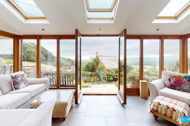 Enjoy the view, whatever the weather, in this lovely room which has underfloor heating.