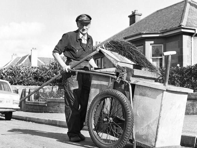 Edinburgh Corporation street cleaner with his cart and besom broom in Ferniehill Road Edinburgh in October 1970.