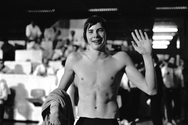Scottish swimmer David Wilkie celebrates after beating his 200 m breast stroke record.