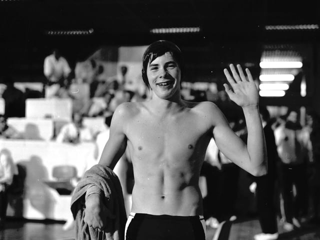 Scottish swimmer David Wilkie celebrates after beating his 200 m breast stroke record.