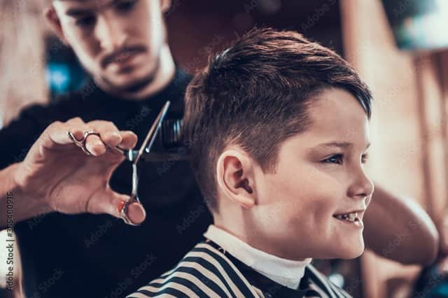 Your child's hairstyling  is in safe hands if you book with a recommended barber or salon (generic photo: Adobe Stock)