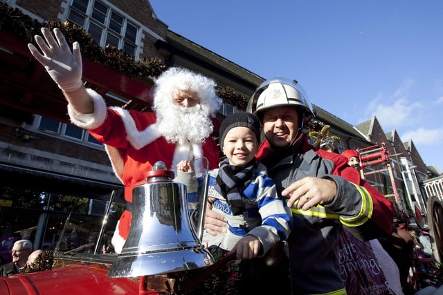 Do you know this happy little boy who rode on Santa's fire engine outside Chesterfield Co-op in 2009?