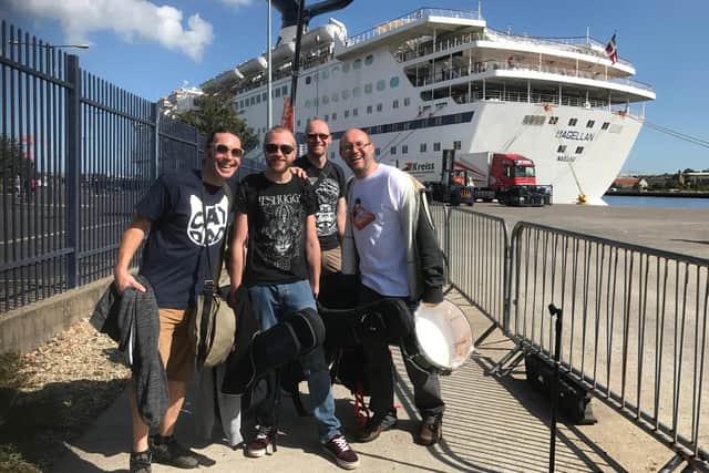 The WonderWhys - singer Aaron Brown, left, guitarist Adam Lowe, bassist Glen Chapman and drummer Haydn Lowe - prepare to join the Rock the Boat Cruise, where they performed.