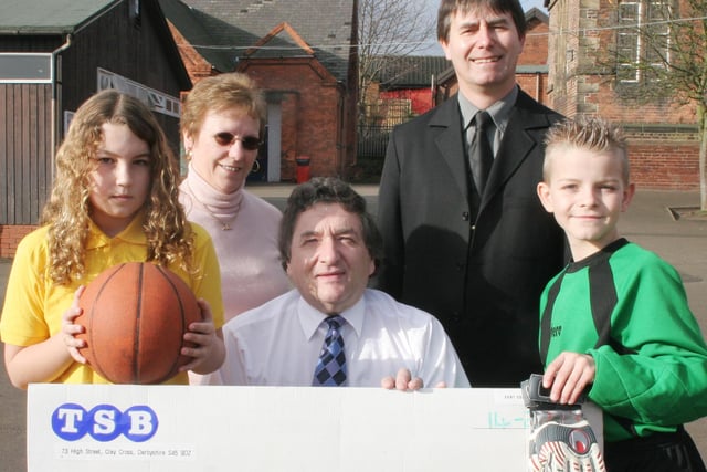 £350 donated to Clay Cross junior school from County Council  l to r Sophie Walton 10yrs. Ann Molyneux, Cllr.Peter Riggott, Allan Denford and Elliott Dickens in 2006