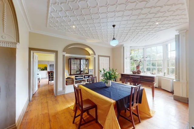 The large dining room is extremely bright thanks to the large bay window at the front of the property.