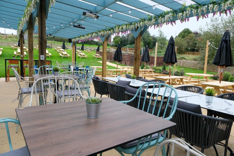 Enjoy a drink or bite to eat in the heated pergola which is a feature of the extended and landscaped garden.