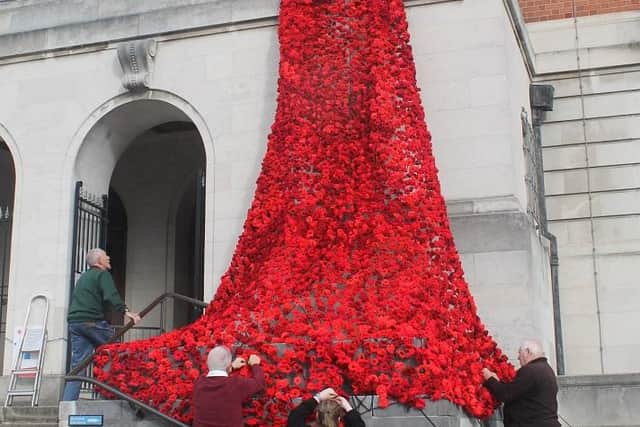 At the end of each Remembrance period the poppy cascades are removed from the balcony of Chesterfield Town Hall and taken to the vehicle sheds at Wallis Barracks where they are hung to dry and then taken down, inspected and any damage repaired, ready to be displayed the following year.