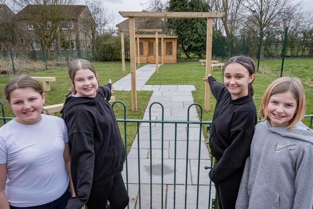 Arbours and benches have also be installed to create separate reading areas and an outdoor teaching area. Lola Newton, Emily Wray, Abi Chapman and Lacey Mapletoft by the Bolsover C of E Junior School are at the new garden.