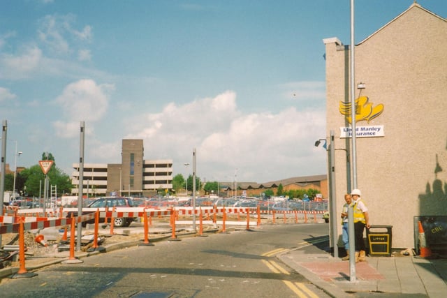 View from Holywell Street to Chesterfield's Donut car park.The former multi-storey car park, now demolished and replaced, is visible in the background
