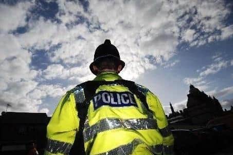 Police are investgating after a woman was bitten by a dog as she jogged in Derbyshire.