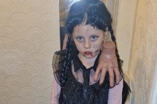 A little girl dressed as Wednesday Addams in photo submitted by Simone Pether.
