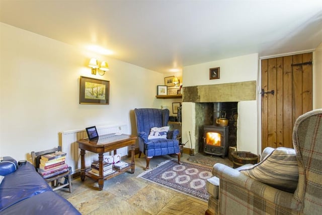 The snug is warmed by a multi-fuel stove housed in a stone hearth  and there is electric underfloor heating.