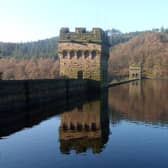 Beautiful autumnal colours form the backdrop to Ladybower dam in the Upper Derwent valley.