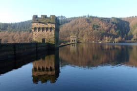 Beautiful autumnal colours form the backdrop to Ladybower dam in the Upper Derwent valley.