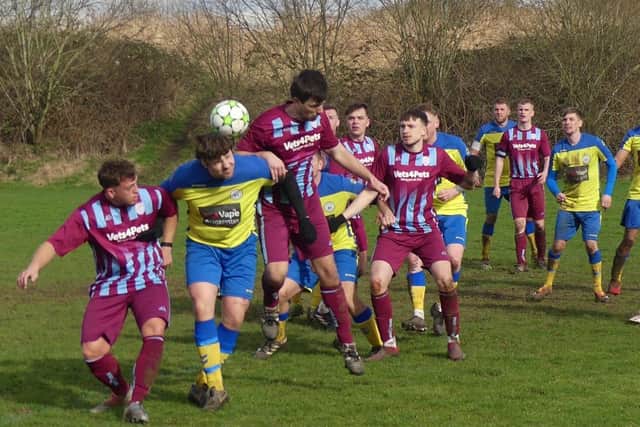 Action from Tupton (yellow/blue) v Clowne Comets (claret/blue) - all photos courtesy of Martin Roberts.