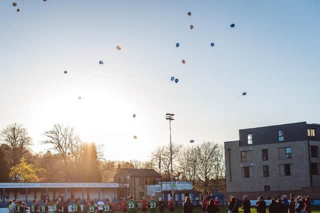 Balloons being released in James' memory