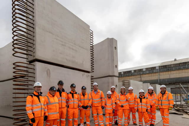 Stanton Precast and EKFB staff in front of some of the completed tunnel segments.
