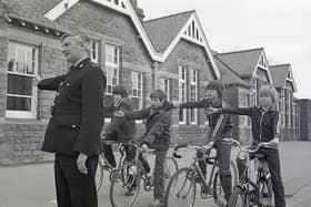 PC Graham Wingfield running a cycling safety course in the school holidays in 1982