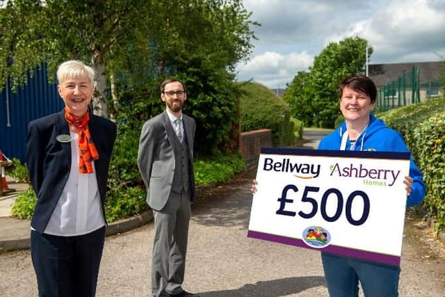 Paula Doleman, head teacher of Ripley Infants School with Bellway and Ashberry sales advisors Rebecca Lawrence and Ben Docherty.