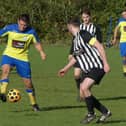 Action from the HKL FIVE game between Tupton (in yellow) and Badger at Furnace Hill, which Tupton won 4-3. All photos by Martin Roberts.