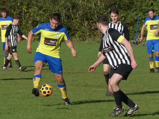 Action from the HKL FIVE game between Tupton (in yellow) and Badger at Furnace Hill, which Tupton won 4-3. All photos by Martin Roberts.
