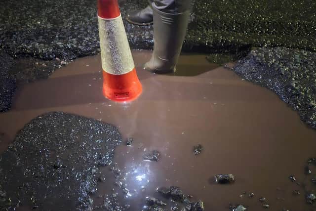 A traffic cone placed in one of Dronfield's worst potholes to illustrate its depth. (Photo: Contributed)