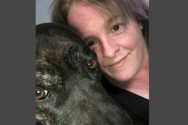 Cheryl Taylor with rescue dog Beauty.