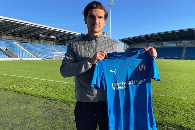 Chesterfield have signed defender Ash Palmer from Stockport County.