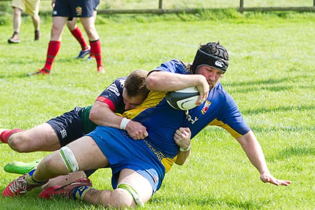 James Harrod goes over to score Matlock's try. Photo by Colin Baker.