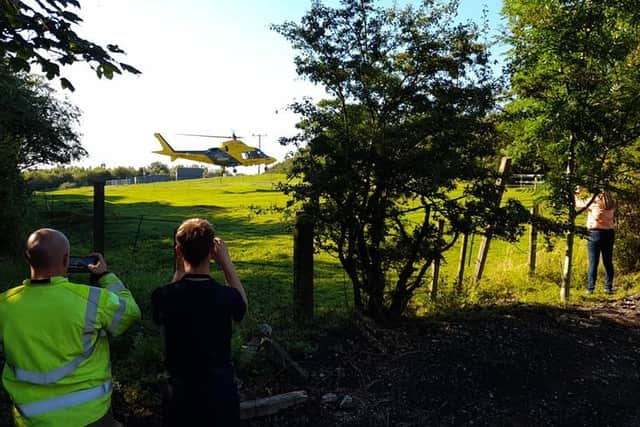 An air ambulance landed in a field to attend to the casualties. Credit: Staveley Fire Station.