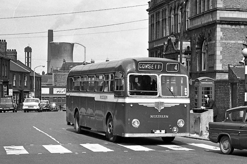 A Northern General Transport Bus heads for Park Lane, as the cooling tower and chimneys of the old power station dominate the skyline in June 1965. Photo: Bill Hawkins.