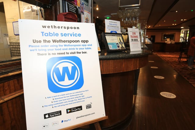 To limit the amount of contact between people, customers are advised to use the Wetherspoons app. Picture: Chris Etchells