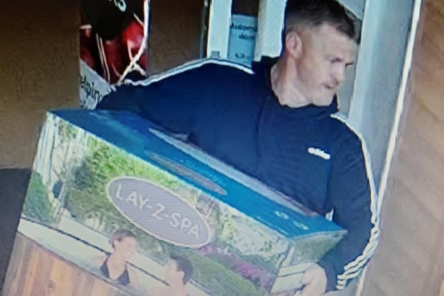 This man was captured on camera leaving Ilkeston's Rutland Street Tesco bearing a luxury Helsinki spa, valued at £870 on May 18. 
Police said: "Male walks in, carries the spa and walks out."