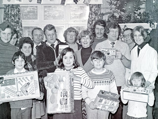 Alfreton Parkwood School presented with gifts, December 1981.