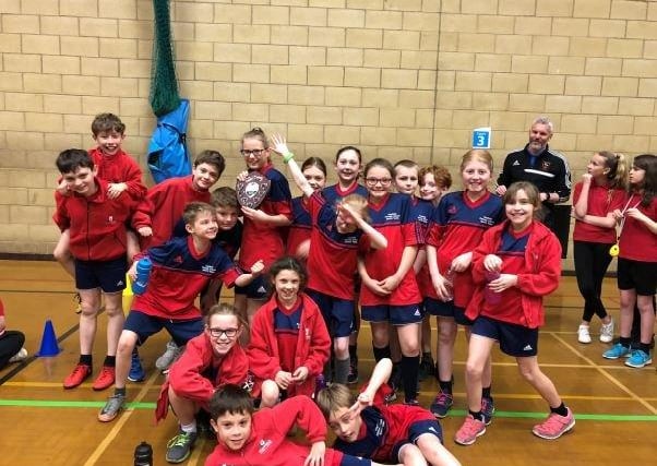 Pupils at Hayfield Primary school celebrate winning the New Mills area primary school indoor sports hall athletics championships